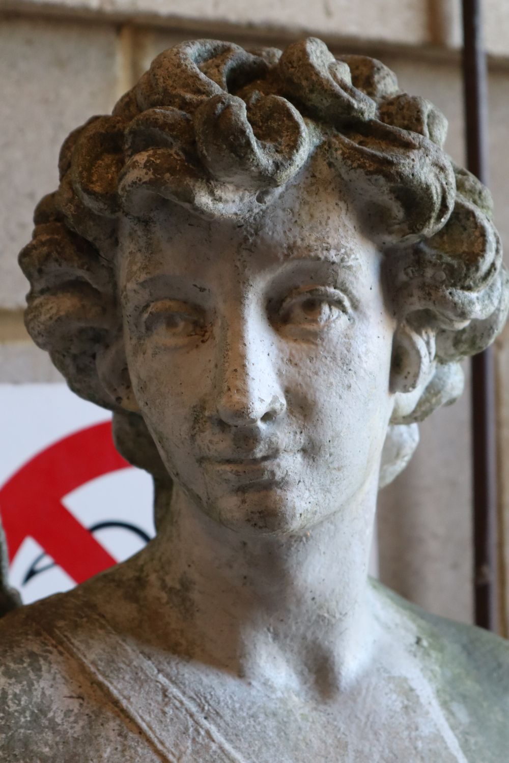 A reconstituted stone garden statue of an archer and hound, height 190cm